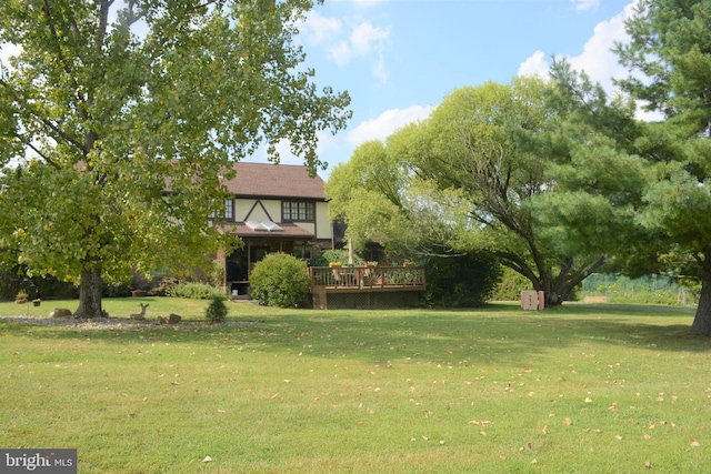 view of yard featuring a deck