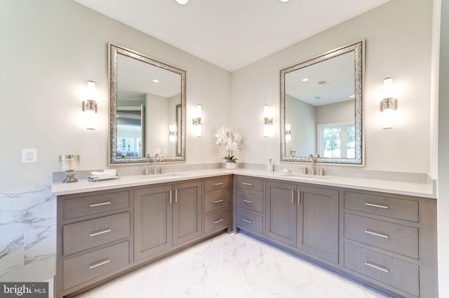 bathroom with double sink vanity and tile flooring