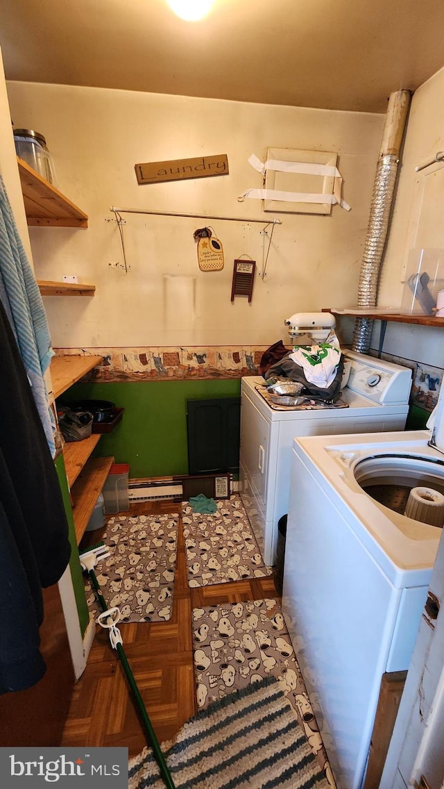 laundry area with independent washer and dryer