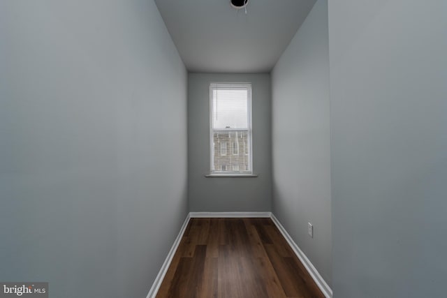 spare room featuring dark hardwood / wood-style floors