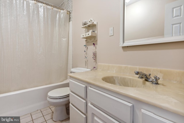 full bathroom featuring shower / tub combo, tile floors, oversized vanity, and toilet