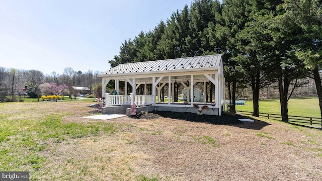 exterior space featuring a yard and a porch