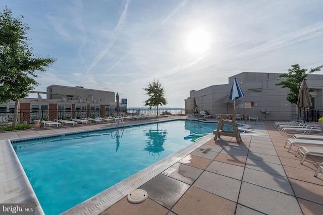 view of swimming pool featuring a patio