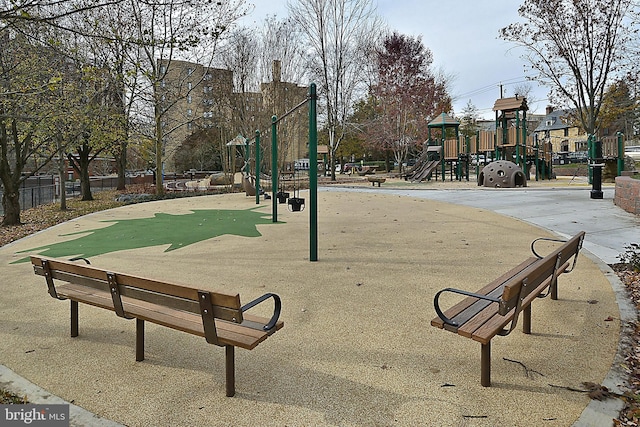 view of property's community with a playground