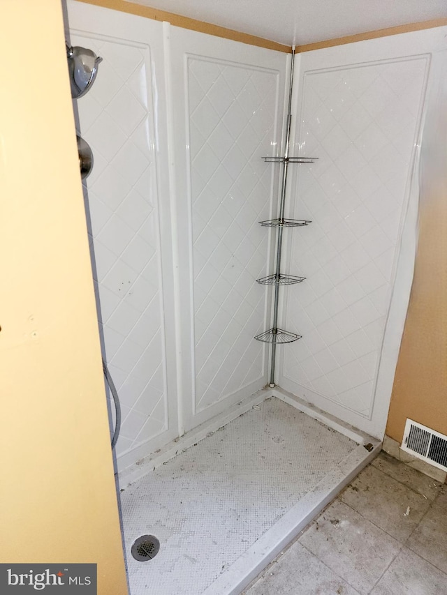 bathroom with tile floors