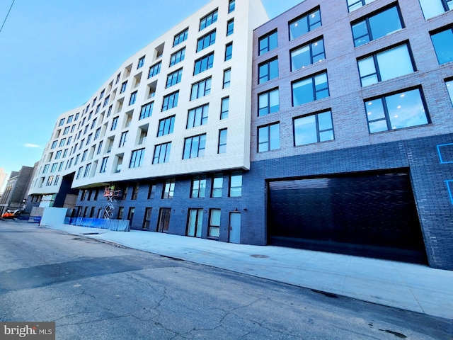 view of building exterior with a garage