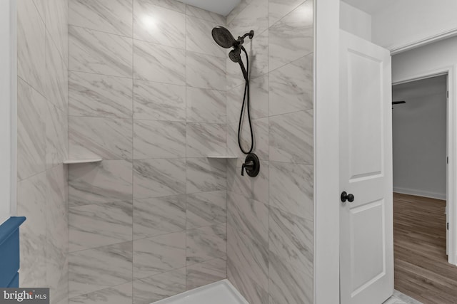 2764 Bellview Dr, Bensalem, PA 19020 - bathroom with a tile shower and wood finished floors