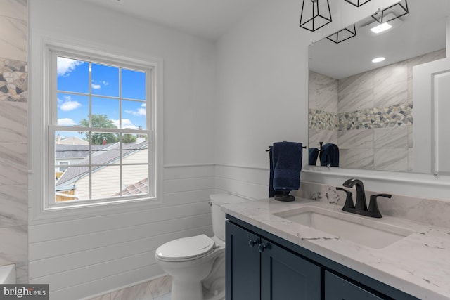 2764 Bellview Dr, Bensalem, PA 19020 - full bath with toilet, vanity, and a wainscoted wall