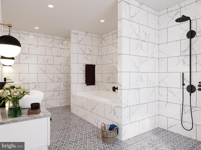 bathroom featuring tile walls, tile flooring, and separate shower and tub