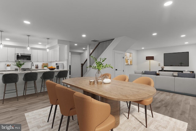 2764 Bellview Dr, Bensalem, PA 19020 - dining area with stairway, light wood-style floors, and recessed lighting
