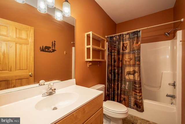 full bathroom featuring vanity, toilet, and shower / tub combo with curtain