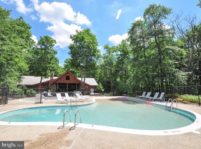 view of pool with a patio