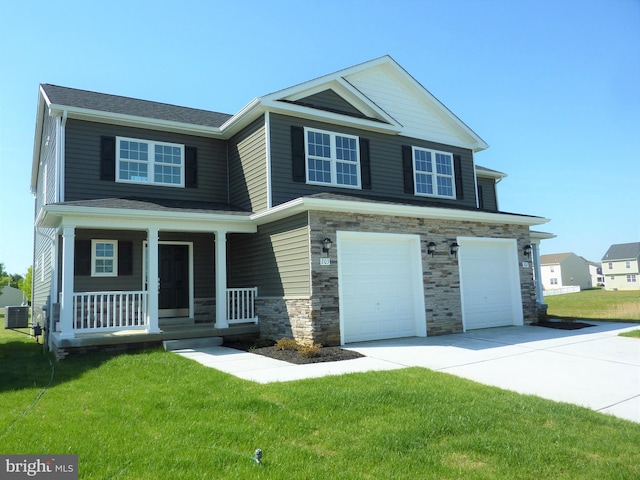 craftsman house featuring a front yard, a porch, central air condition unit, and a garage