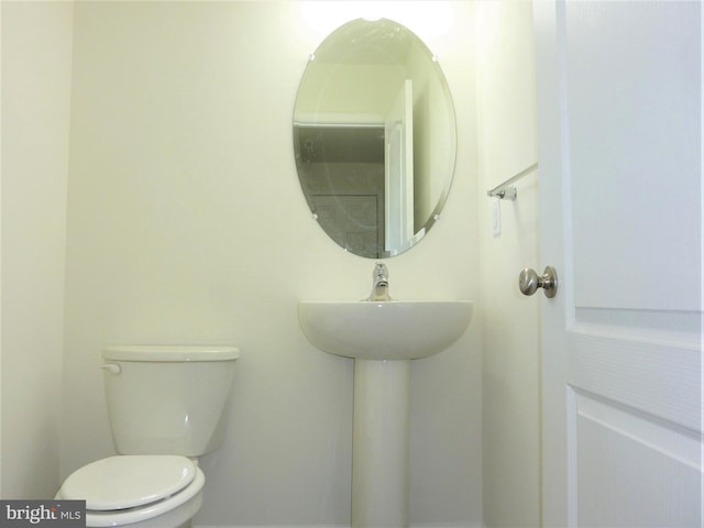 bathroom featuring toilet