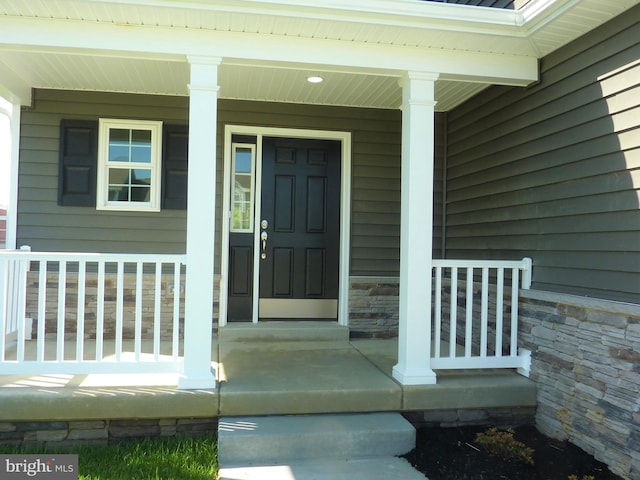 property entrance with a porch