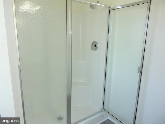 bathroom with an enclosed shower