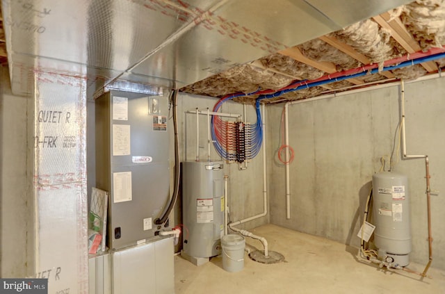 utility room with water heater and gas water heater