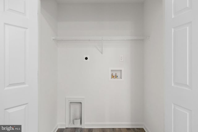 clothes washing area featuring hookup for a washing machine, dark hardwood / wood-style flooring, and electric dryer hookup