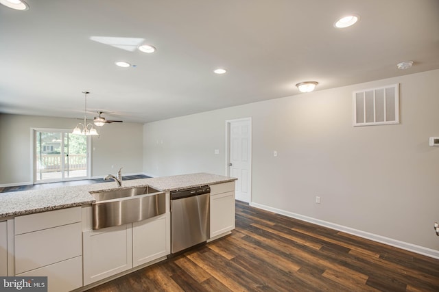 kitchen featuring white cabinetry, a notable chandelier, dark hardwood / wood-style floors, and stainless steel dishwasher