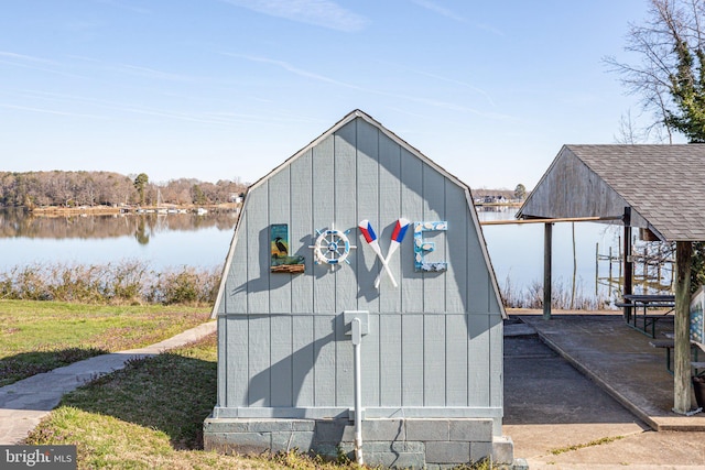 view of shed / structure featuring a water view