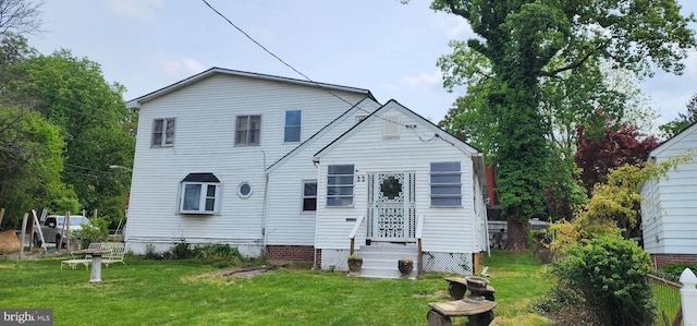 view of front of home with a front yard