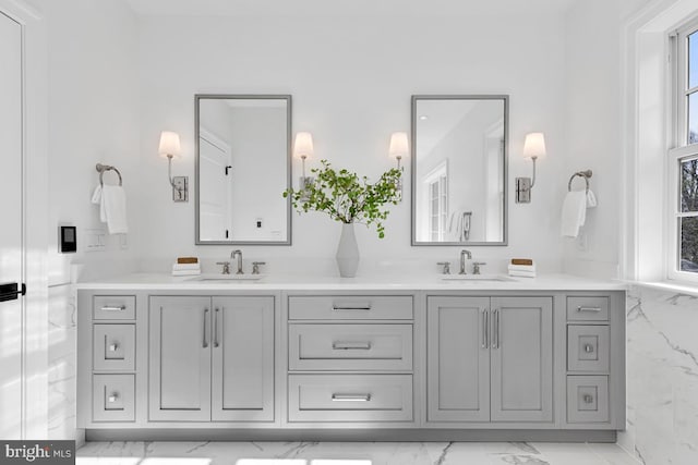 bathroom featuring tile flooring, large vanity, and double sink