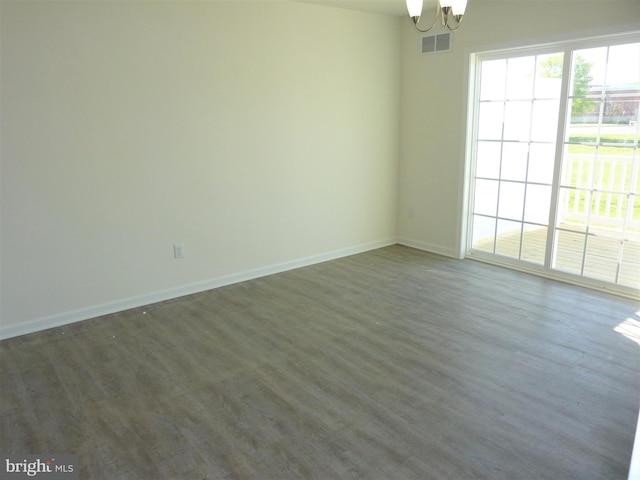 unfurnished room featuring dark wood-type flooring