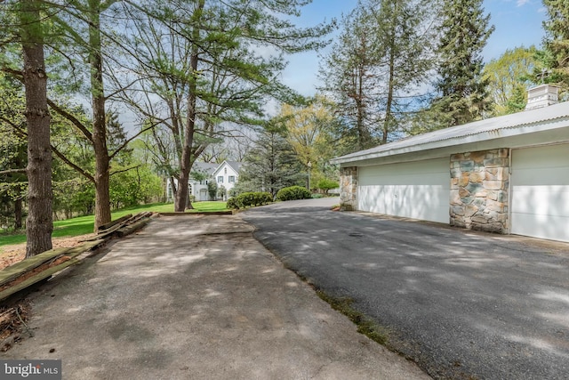 view of side of property featuring a garage