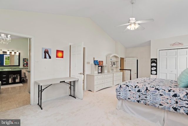 carpeted bedroom with lofted ceiling, ceiling fan with notable chandelier, and a closet