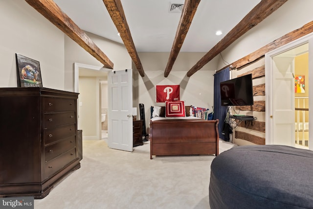 carpeted bedroom featuring beam ceiling