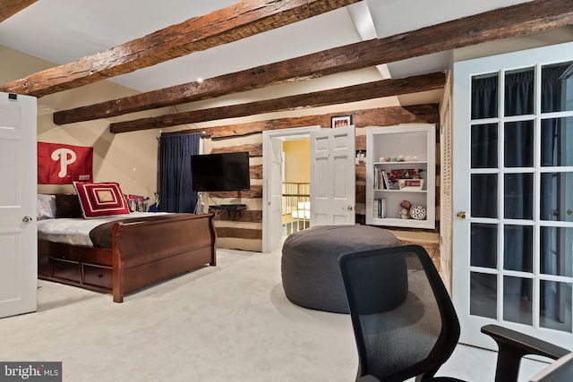 carpeted bedroom featuring beamed ceiling