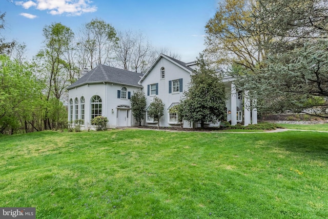 view of front of house with a front yard