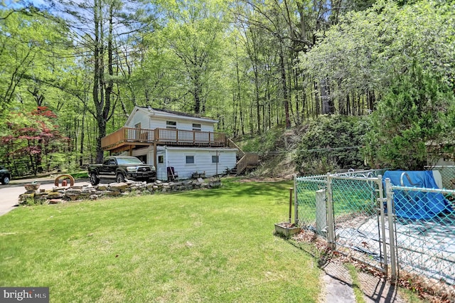 view of yard with a deck