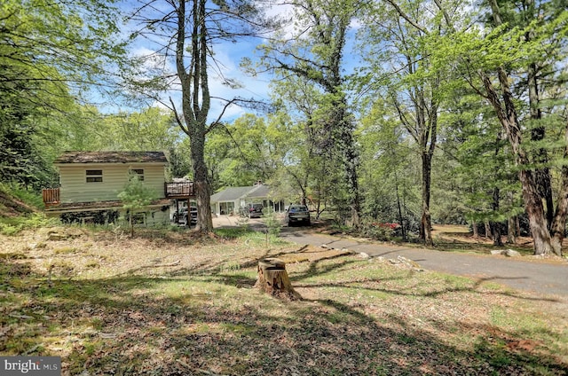 view of yard with a wooden deck