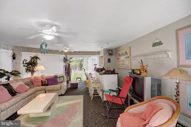 living room with carpet floors and ceiling fan