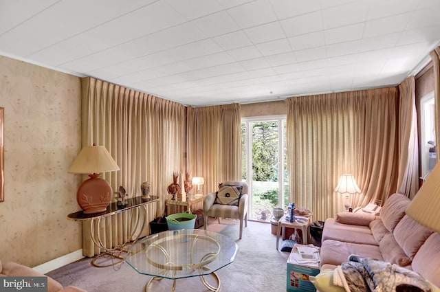 living area with light colored carpet