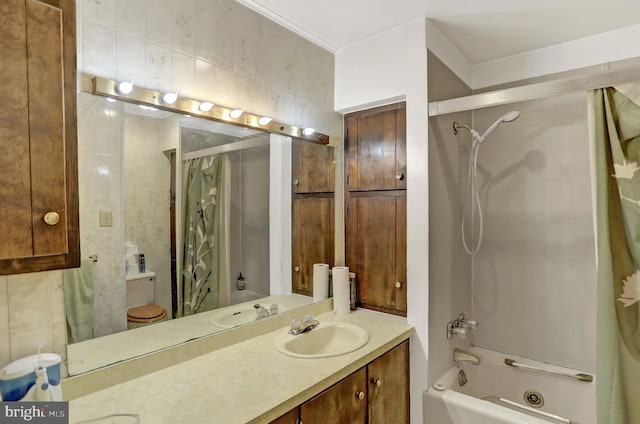 full bathroom with toilet, shower / bath combination, vanity, and tile walls