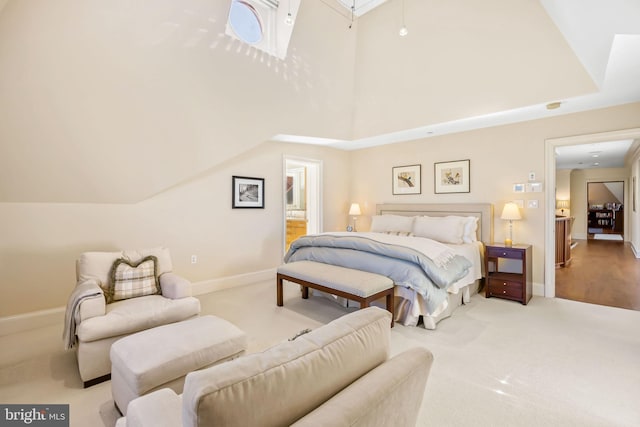 bedroom featuring light colored carpet