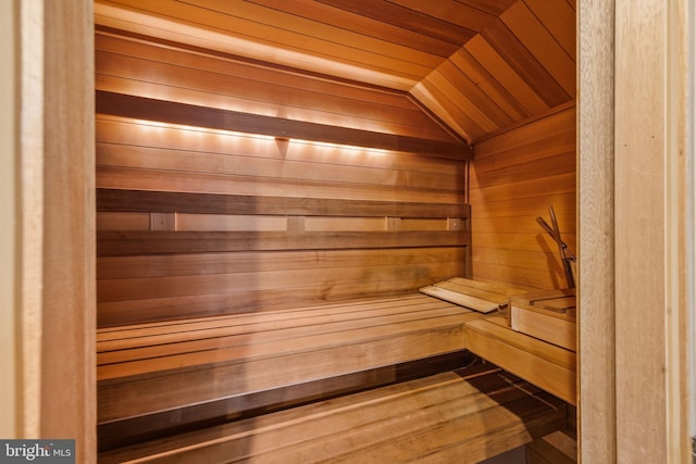 view of sauna / steam room with wooden walls