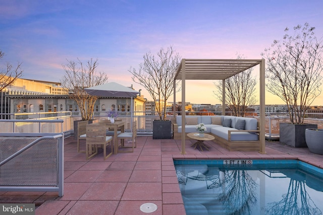 patio terrace at dusk with a pergola, an outdoor living space, and a fenced in pool