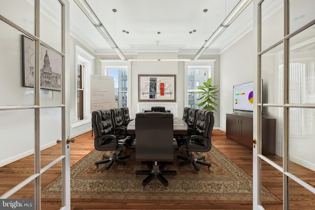 office space with ornamental molding, hardwood / wood-style flooring, and french doors