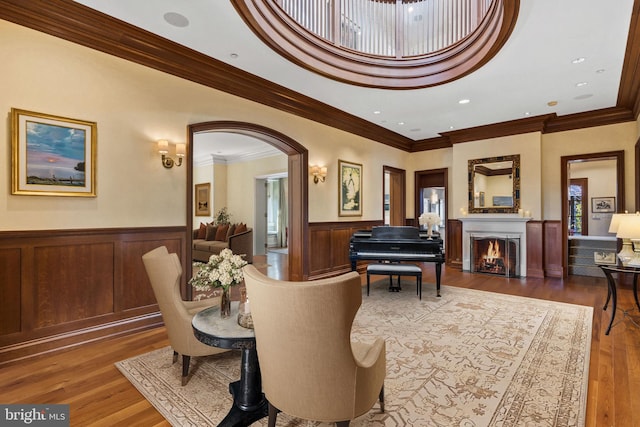 interior space featuring ornamental molding, dark wood-type flooring, and a wealth of natural light