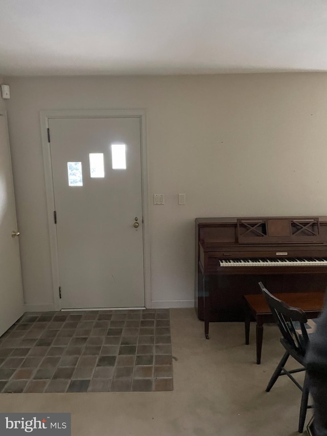 foyer entrance featuring tile flooring