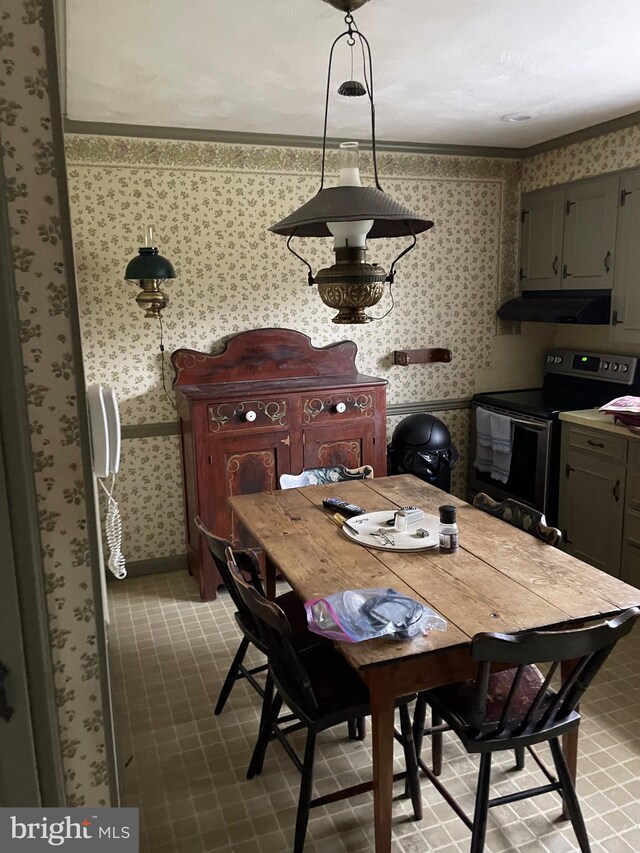 dining area featuring tile flooring