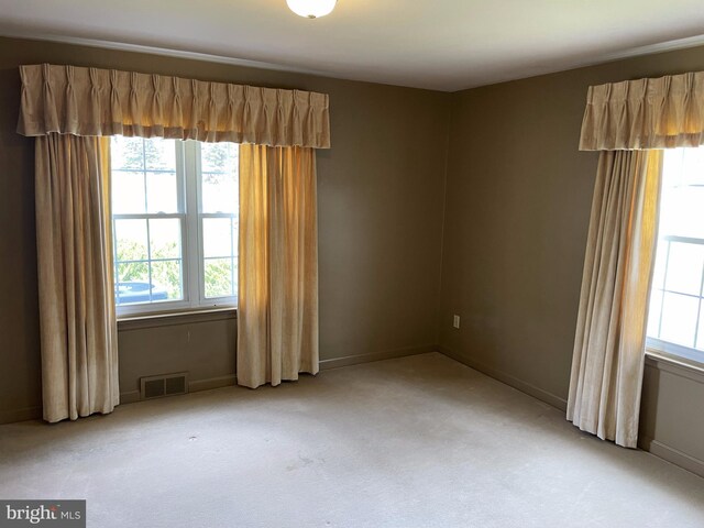 view of carpeted spare room