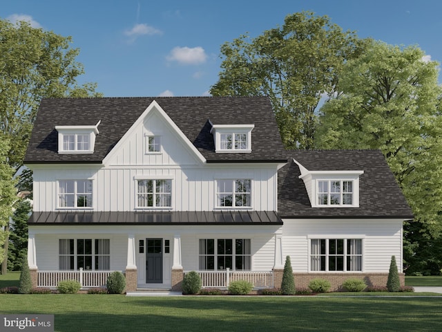 view of front facade featuring covered porch and a front lawn