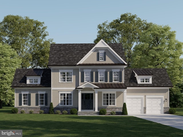 view of front facade with a front yard and a garage