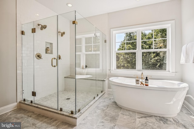 bathroom with plus walk in shower and tile floors