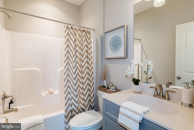 full bathroom featuring shower / tub combo with curtain, toilet, and vanity