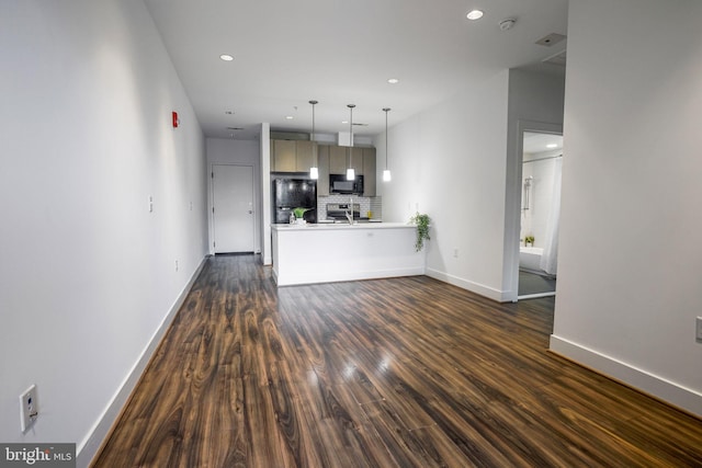 unfurnished living room with dark hardwood / wood-style flooring